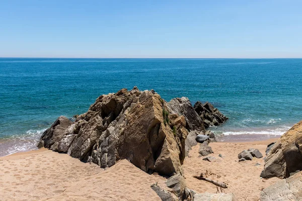 Golden sand on a totally empty Sant Pol de Mar beach near Barcelona and Cost Brava at the times of coronavirus lockdown