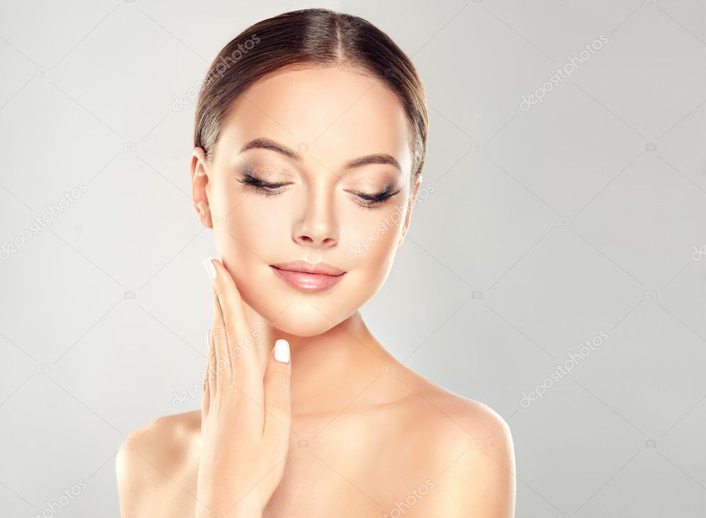 Young Woman with Clean Fresh Skin .