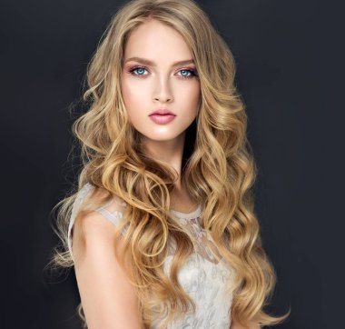 Blonde fashion  girl with curly hair 