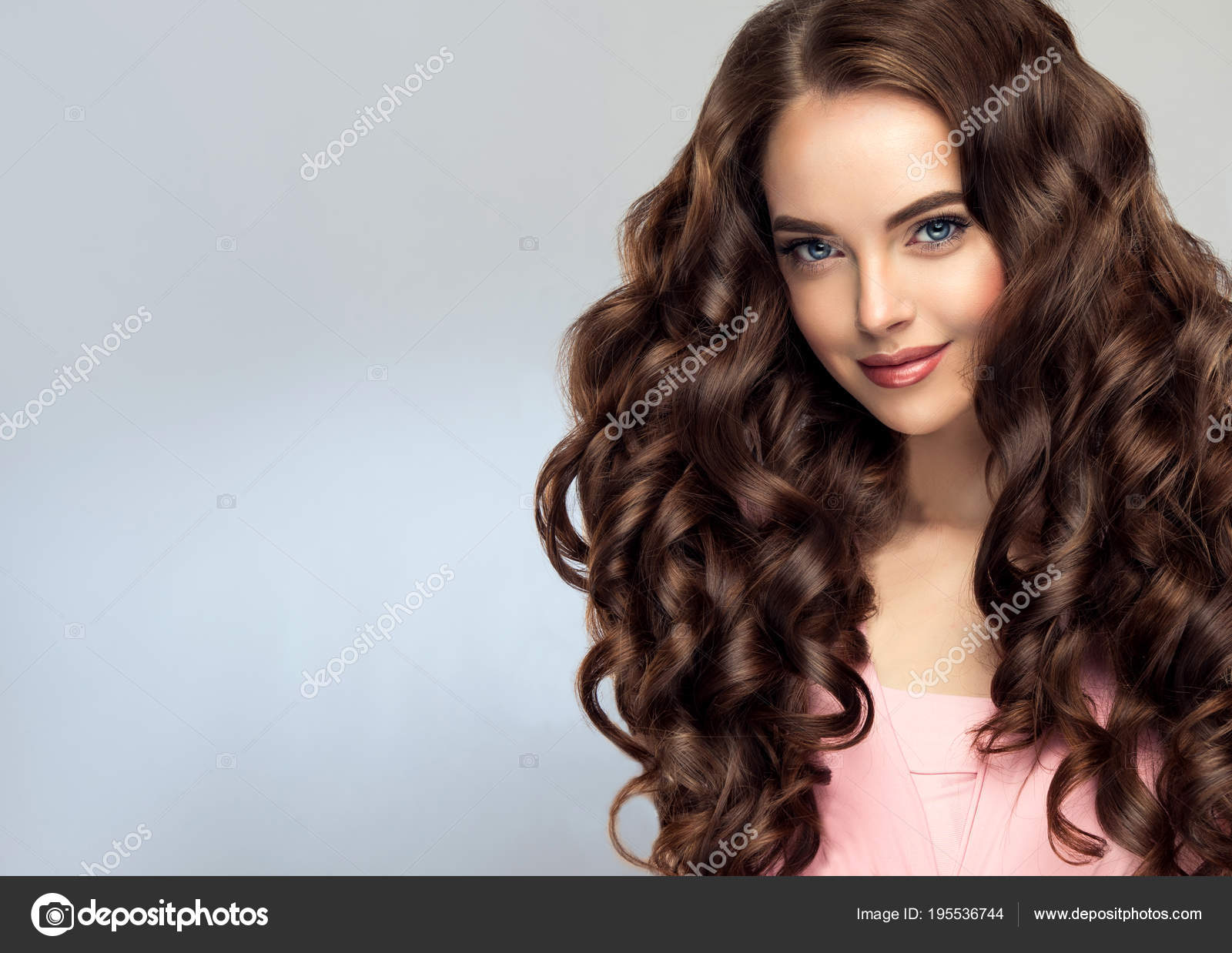Brunette Girl Long Healthy Shiny Curly Hair Beautiful Model Woman Stock  Photo by ©Sofia_Zhuravets 195536744