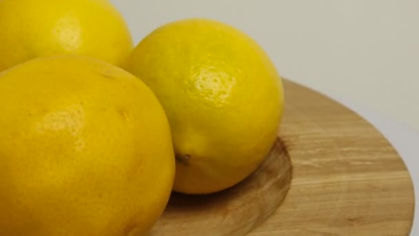 Yellow lemon with sour taste, citrus fruit, vitamins for healthy diet — Stock Video