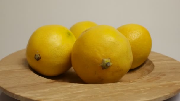 Yellow lemon with sour taste, citrus fruit, vitamins for healthy diet — Stock Video