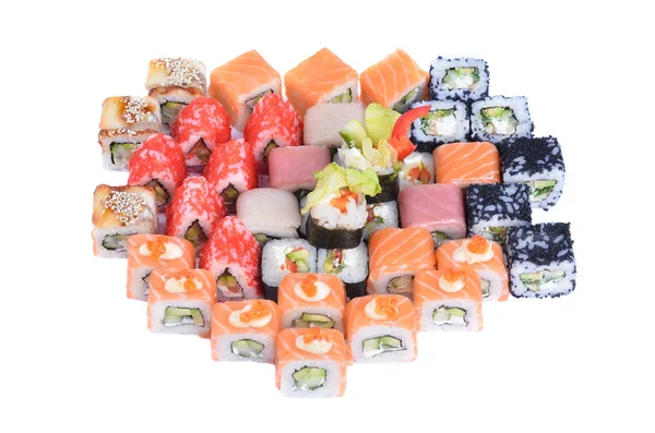 Japanska stora uppsättning blandade rullar och sushi med lax, räkor och gurka — Stockfoto