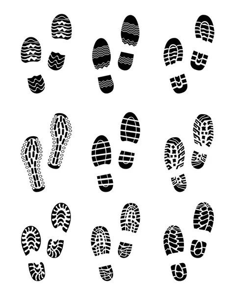 Black prints of shoes — Stock Vector