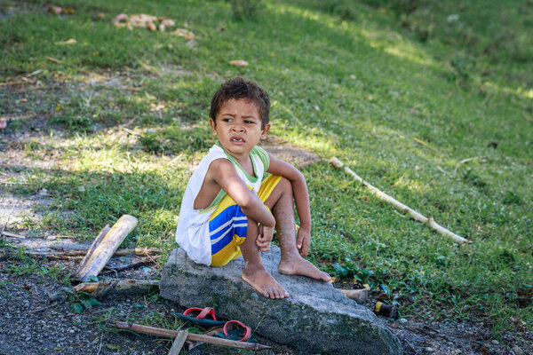 Portrait of Aeta tribe little boy near Mount Pinatubo on Aug 27,