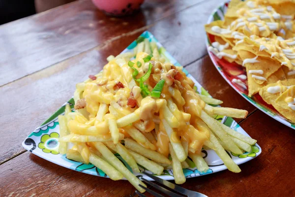 French fries with cheese — Stock Photo, Image