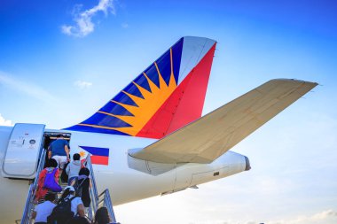 Philippine Airlines (PAL) at Caticlan airport clipart
