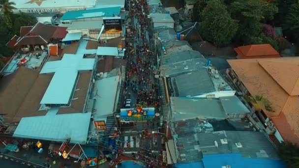 Aerial: Bangla road, many people celebrating Songkran. — Stock Video
