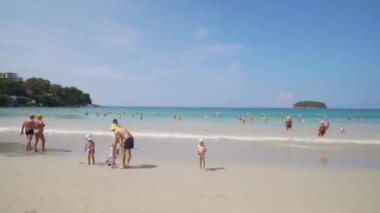 PHUKET, THAILAND December 15, 2017: Hyperlapse of people walking on the beach.