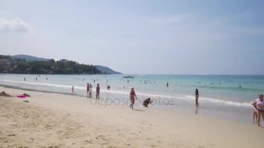 PHUKET, THAILAND December 15, 2017: Hyperlapse of people walking on the beach.