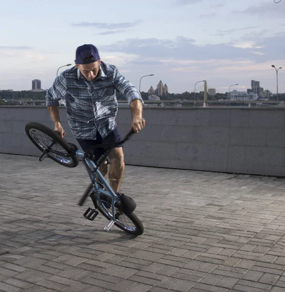 Bmx freestyle. A man on bmx doing tricks.