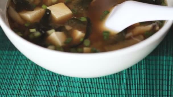 Tracking shot of miso soup bowl — Stock Video