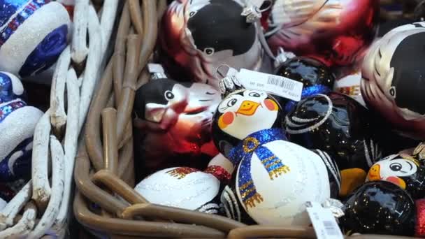 Colorful Christmas Baubles Shape Birds Pinguins Baskets Sale Panning Close — Stock Video