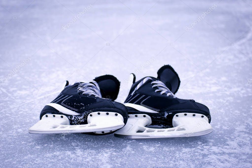 Skates for hockey on the outdoor ice winter.