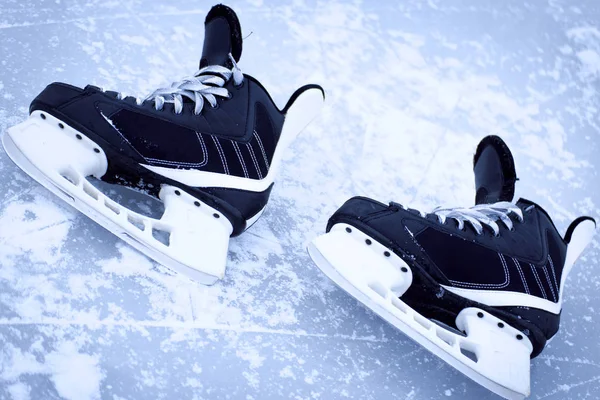 Skates for hockey on the outdoor ice winter.