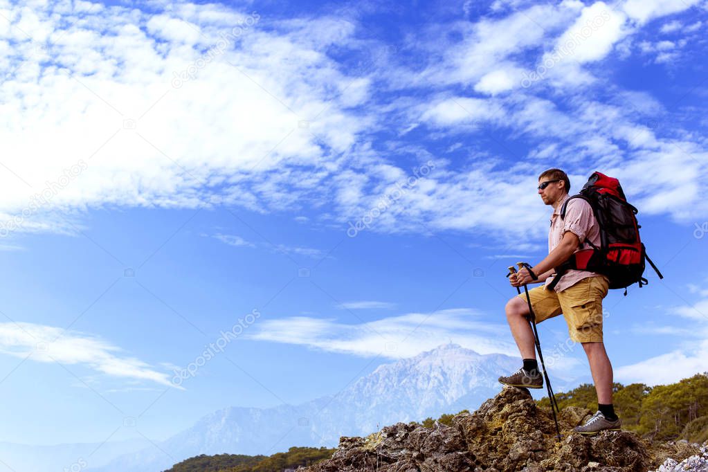 Hiking in the mountains in the summer on a sunny day.