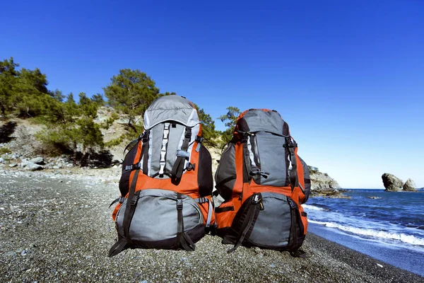 Backpacks on the beach in the summer campaign. — Stock Photo, Image