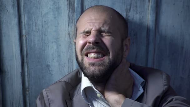 Man who lost his job, alone cries leaning against the wall — Stock Video