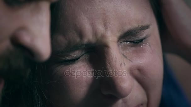 Depressed and sad young woman crying leaning on boyfriend — Stock Video