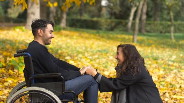 Man Wheelchair His Girlfriend Smiles Park — Stock Video