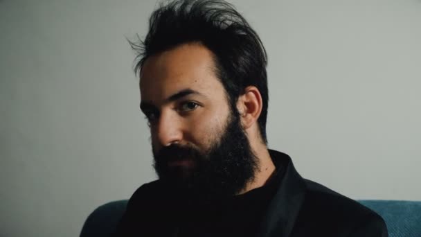 Closeup Angry Serious Bearded Man Turns His Head Looking Camera — Stock Video