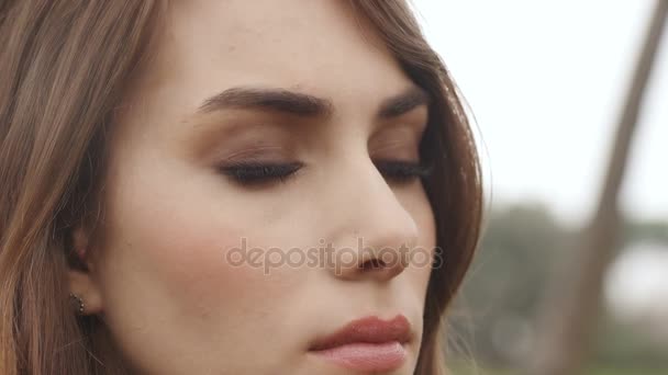 Thoughtful Young Woman Looks Close Portrait — Stock Video