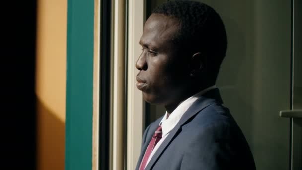 Depressed Sad African American Businessman Window — Stock Video