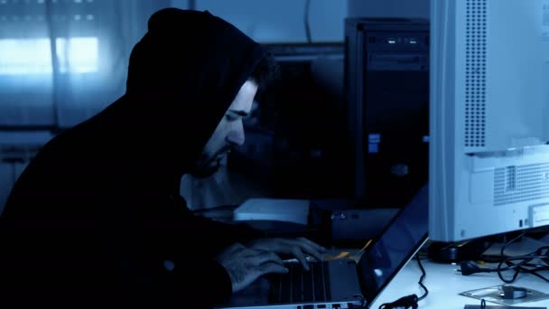 Hacker Attacking Computer System Dark Office Profile — Stock Video