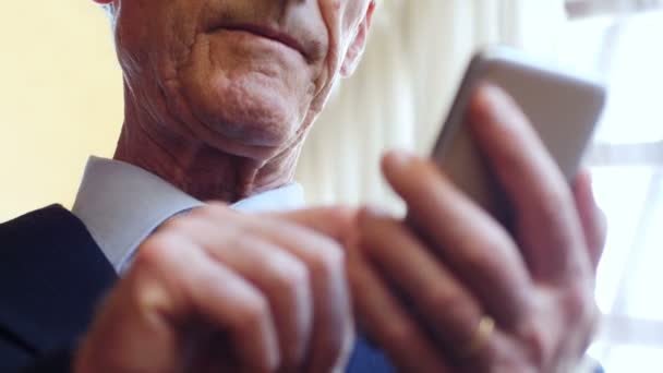 Close Hands Unrecognisable Old Businessman Using Smartphone — стоковое видео