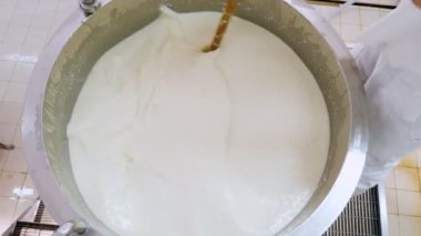 Cheese Factory, making cheese-cheese maker ordering the ricotta molds