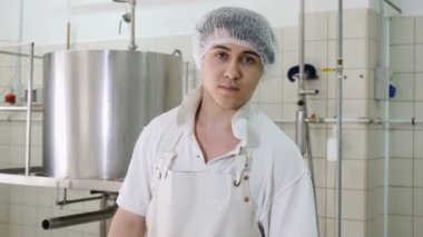 Cheese Factory, making cheese-cheese maker ordering the ricotta molds