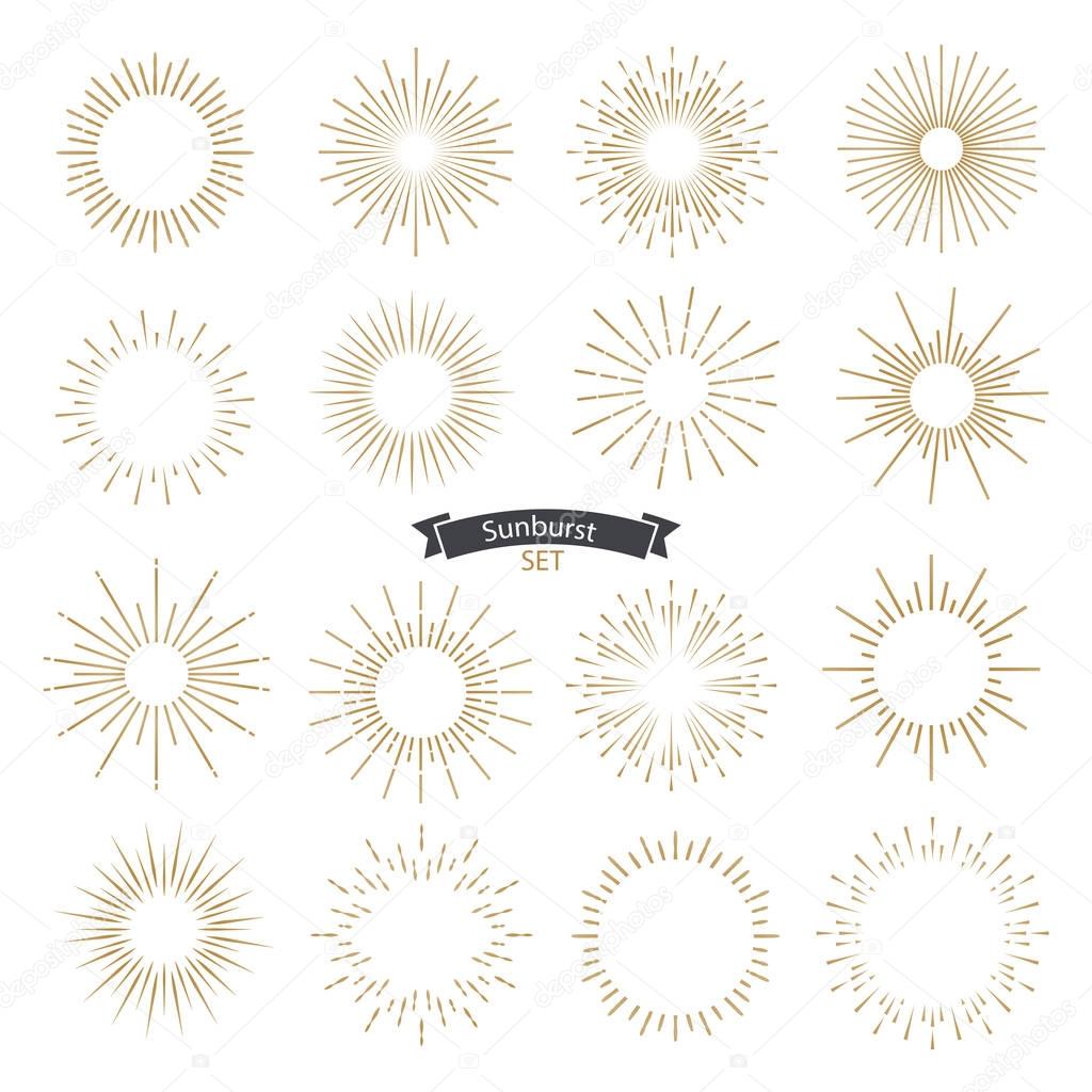 Set of sunburst design elements gold color. Vintage style elements for graphic and website design. Vector light rays elements