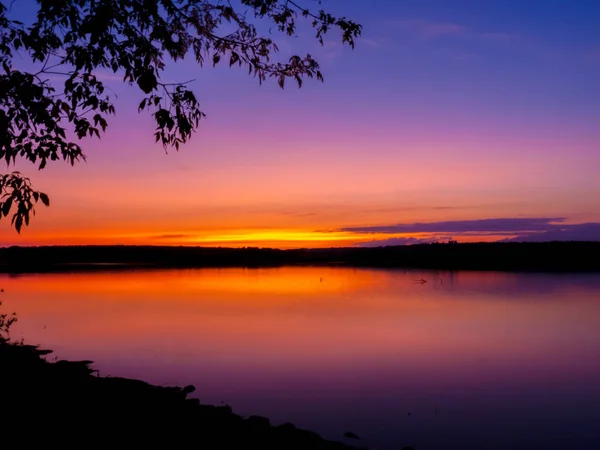 Lake with reflection of amazing fiery sky — Stock Photo, Image