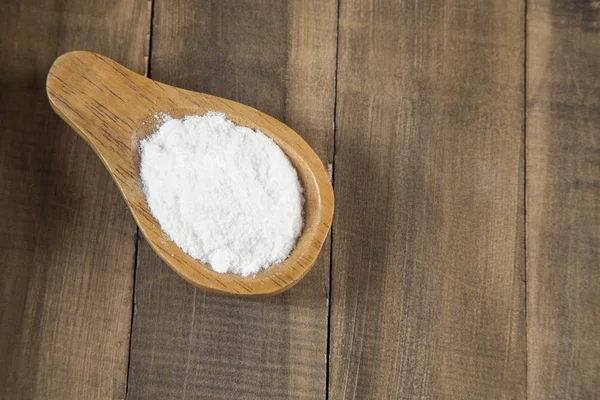 Sodium bicarbonate wooden spoon — Stock Photo, Image