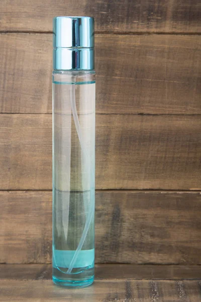 Perfume for men in blue glass container