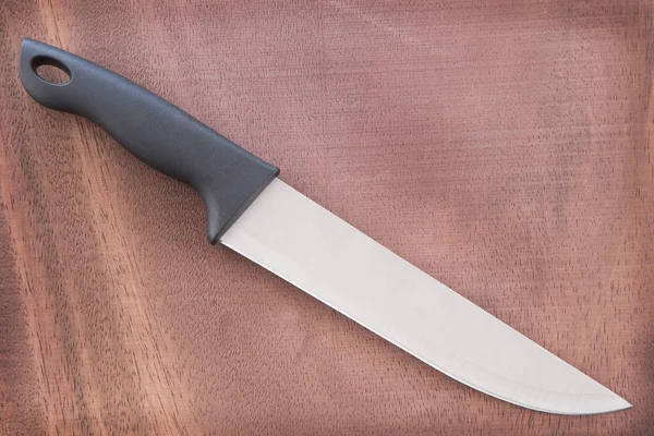 Knife with black grip — Stock Photo, Image