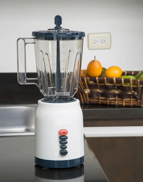 Blender and fruits and kitchen space — Stock Photo, Image