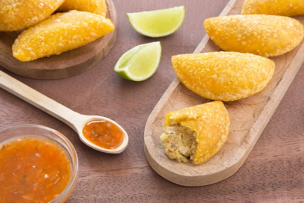 Colombian empanada with spicy sauce — Stock Photo, Image