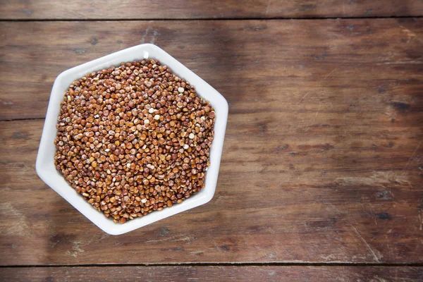 Organic red quinoa in the bowl - Chenopodium quinoa