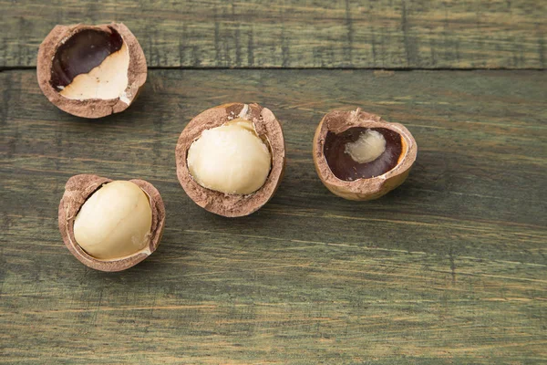 Organic Macadamia Nuts Wooden Table — Stock Photo, Image