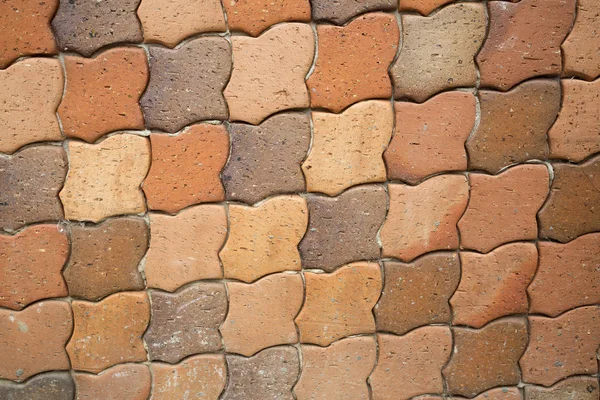 Wall with brick color tile veneer