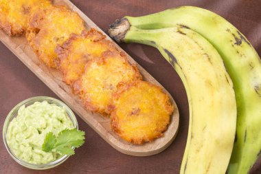 Düzleştirilmiş adet yeşil muz (tostn, tachino Patacn kızarmış)