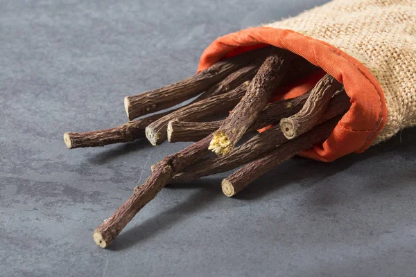 Licorice root in the cloth bag — Stock Photo, Image