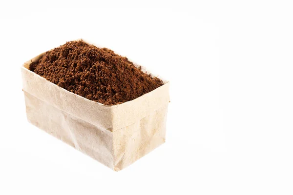 Кофе - зерна органического кофе в бумажном пакете — стоковое фото