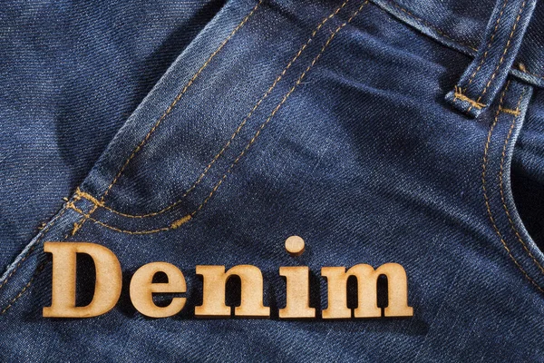 Denim in houten letters met jeans achtergrond - Tekstruimte — Stockfoto