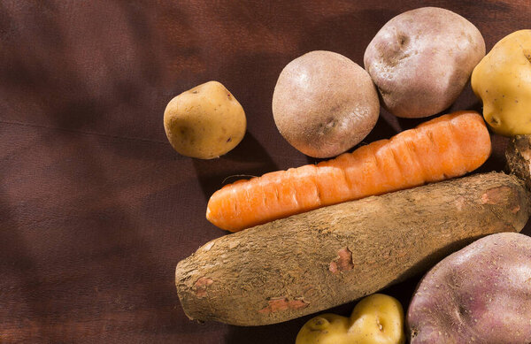 Cassava, carrot, potato, onion, traditional Colombian vegetables.