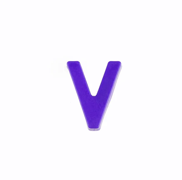 Carta V do alfabeto - Peça em plástico violeta — Fotografia de Stock