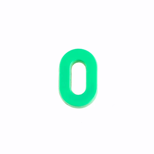 Letra O del alfabeto - Pieza de plástico verde — Foto de Stock
