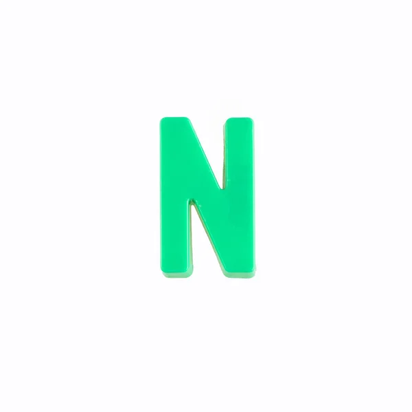 Letter N of the alphabet - Piece in green plastic — Stock Photo, Image