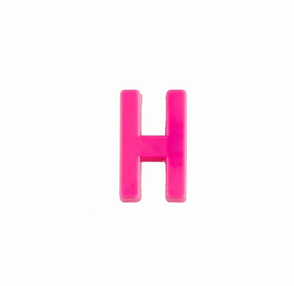 Letter H in het roze - Kunststof stuk — Stockfoto